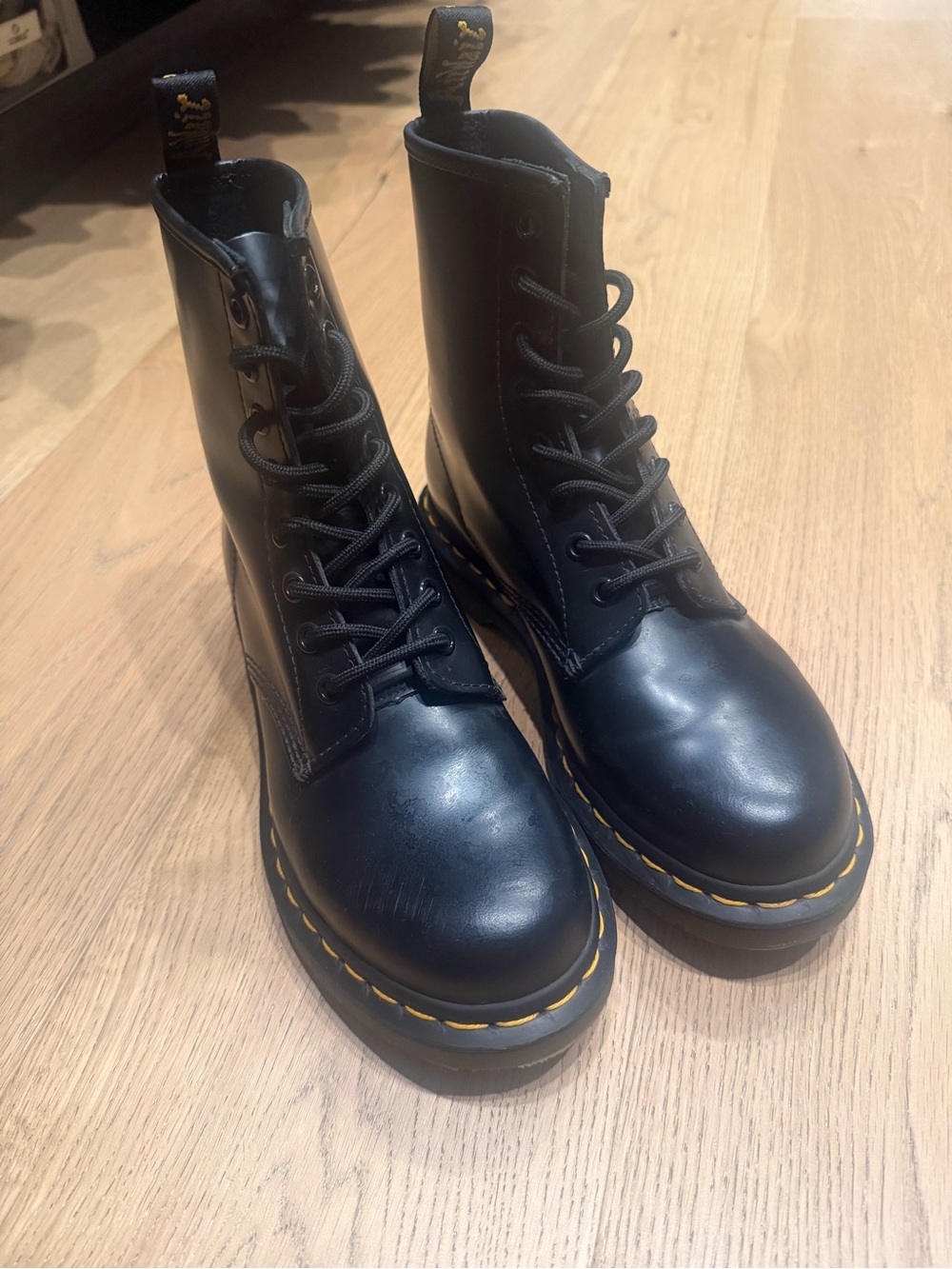 Dr. Martens Black Leather Lace-Up Platform Boots with Yellow Stitching